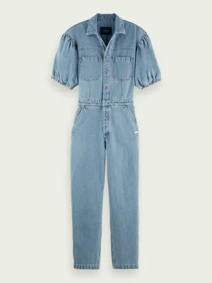 Voluminously sleeved denim jumpsuit in Washed Indigo